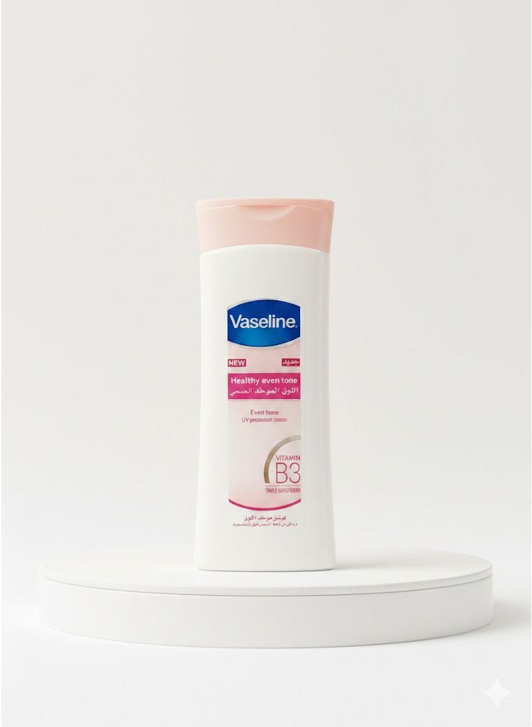 فازلين لوشن فازلين Healthy Even Tone موحد لون البشرة بفيتامين B3 – مرطب للجسم + حماية UV – رائحة منعشة – حجم كبير - Image 1